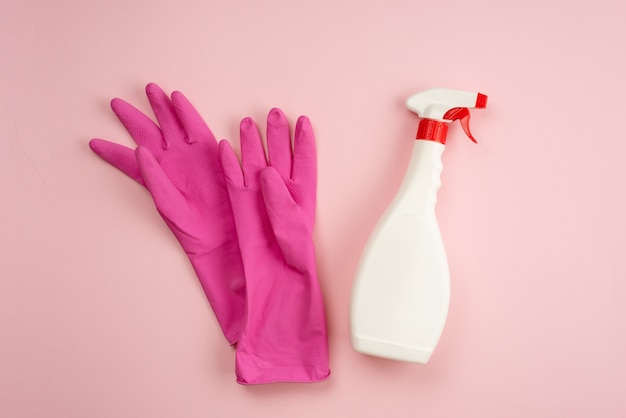 Latex gloves and spray bottle. Cleaning concept