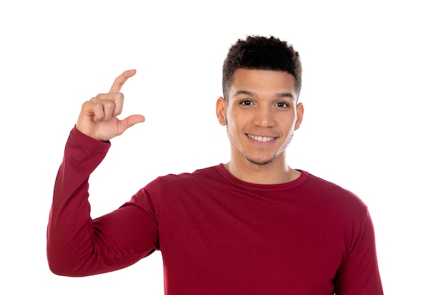 Latin guy with short afro hair isolated on white wall