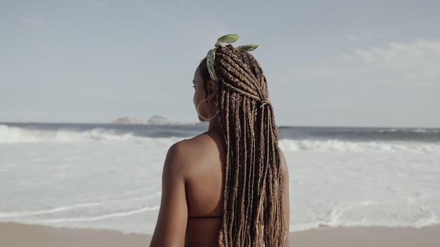 Latin young girl famous beach Rio de Janeiro Brazil Latin summer vacation holiday