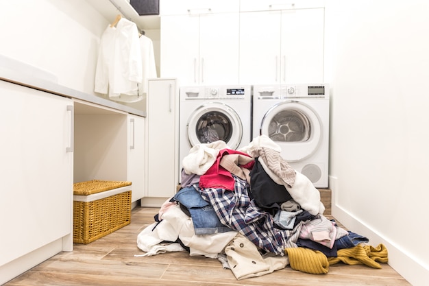 Laudry room with a pile of dirty clothes