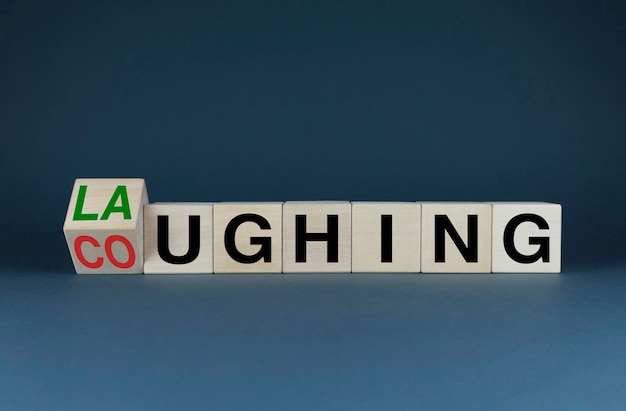 Laughing or Coughing The dice form the choice words Laughing or Coughing