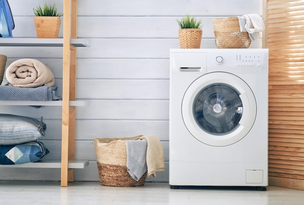 Laundry room with a washing machine