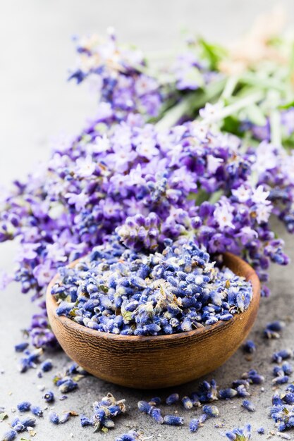 Lavender flowers, bouquet on rustic table, overhead.