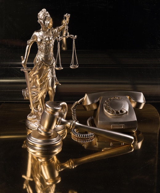 law concept golden Themis and hammer