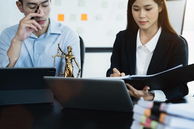 Lawyer business man working with paperwork on his desk in office workplace for consultant lawyer in office