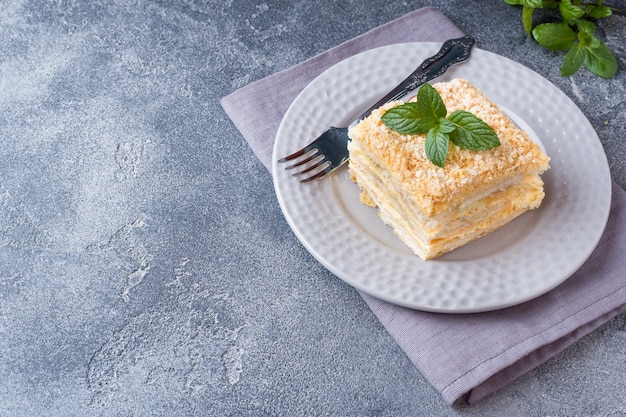 Layered cake with cream Napoleon millefeuille vanilla slice with mint 