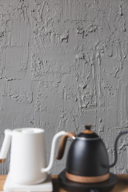 Layout in a loft style in dark colors open space interior view of various coffee Welcome open coffee shop background