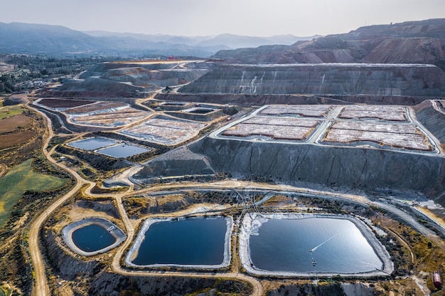 Leaching heaps and storage reservoirs at copper ore processing plant Skouriotissa Cyprus