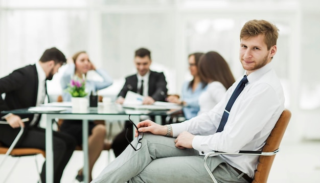 Leading lawyer of the company on the background of the working meeting the business team