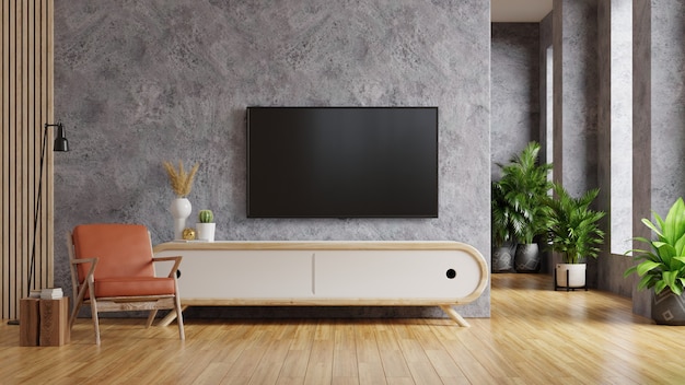 Leather armchair and a wooden cabinet in living room interior with plant,TV on concrete wall.3d rendering