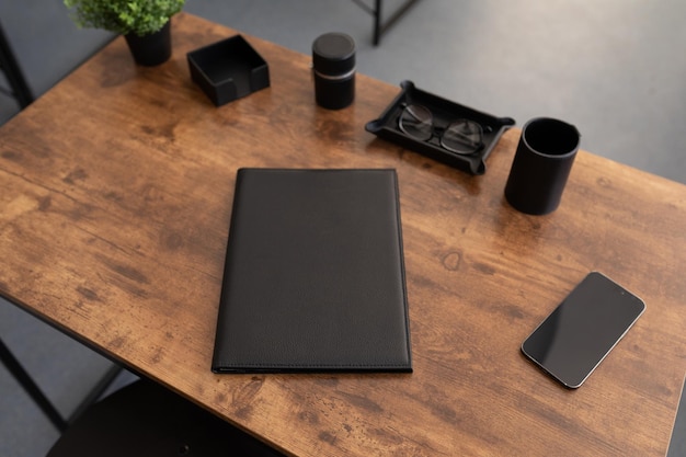 Leather folder for documents on the office table in the office