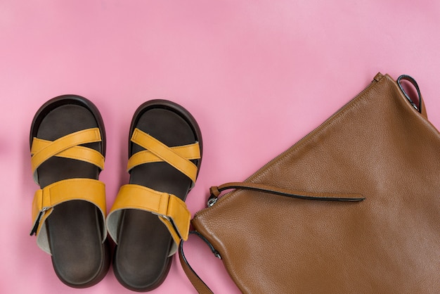 Leather handbag and yellow casual  shoes 