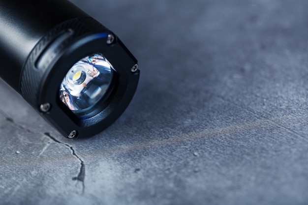 Led black lantern closeup on gray textured background free space