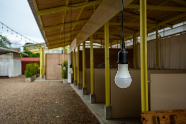 Led hanging lamps in front of the shop and copy space