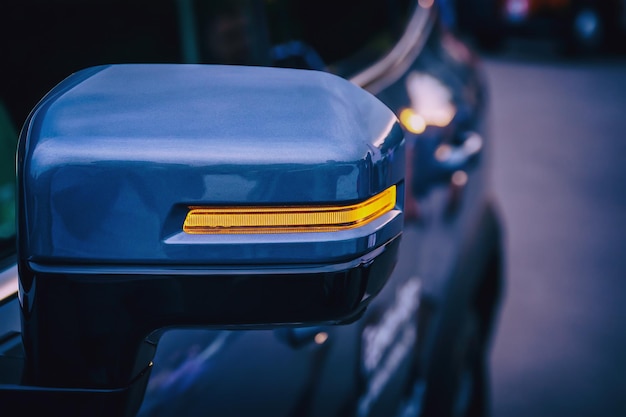 LED turn signal on side rearview mirror of car