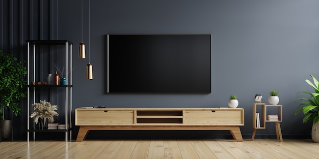 LED TV on the dark wall in living room with wooden cabinet,minimal design