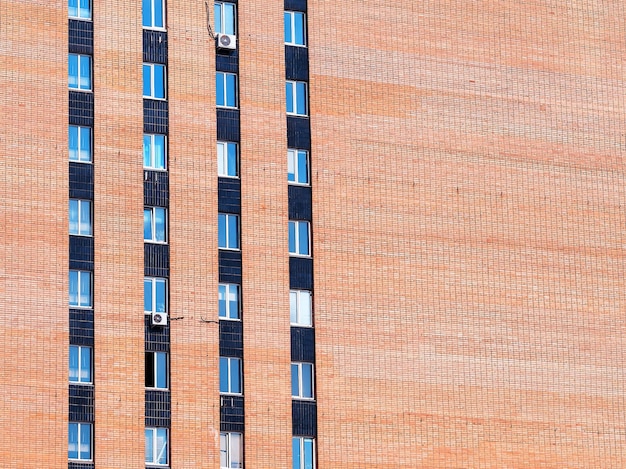 Left aligned windows in brick building backdrop