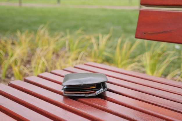 Left wallet on a bench in the park