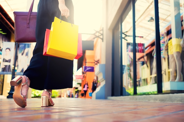 Leg of woman with a shopping bags 