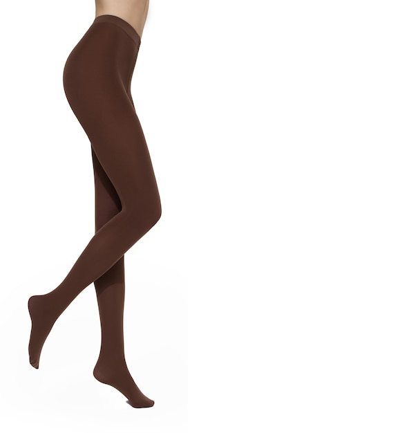 Legs of a woman in  brown nylon tights on white background