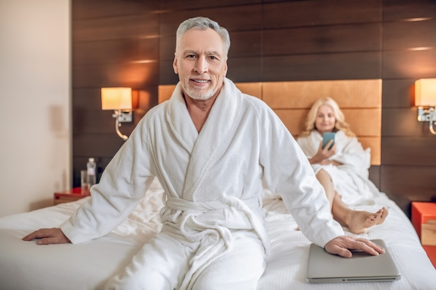 Leisure. Couple in bath robes spending a day together and feeling relaxed