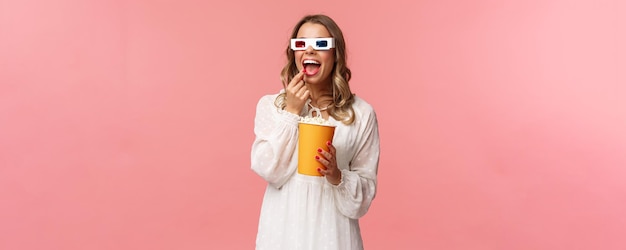 Leisure goingout and spring concept portrait of attractive young woman in white dress enjoying watch