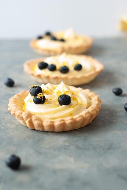 Lemon cream tarts with a lemon curd filling