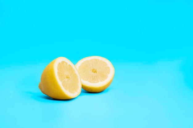 Lemon fruit on a blue background