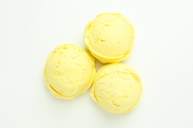 Lemon ice cream on white background close up