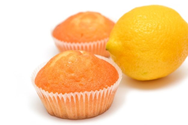 Lemon muffins on white background