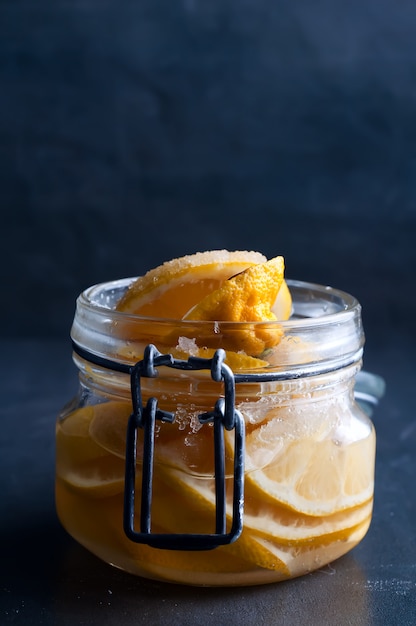 lemon slices on a dark background