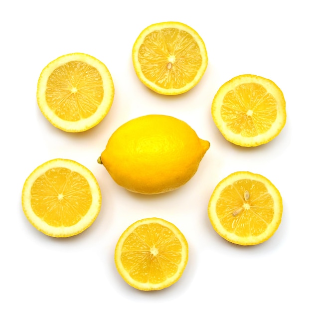 Lemon whole and sliced isolated on white background. Flat lay, top view