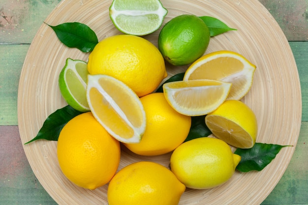 Lemons and limes on a wooden.