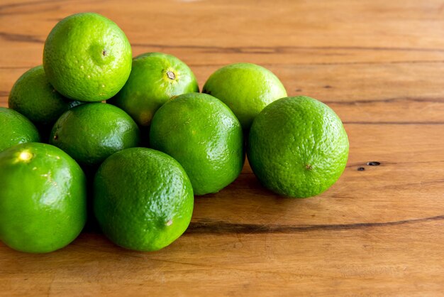 Lemons on a wooden table, citrus fruit.