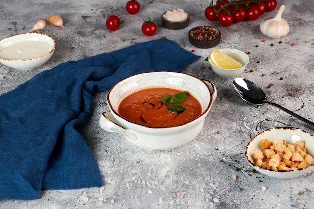 Lentil puree soup in a white bowl