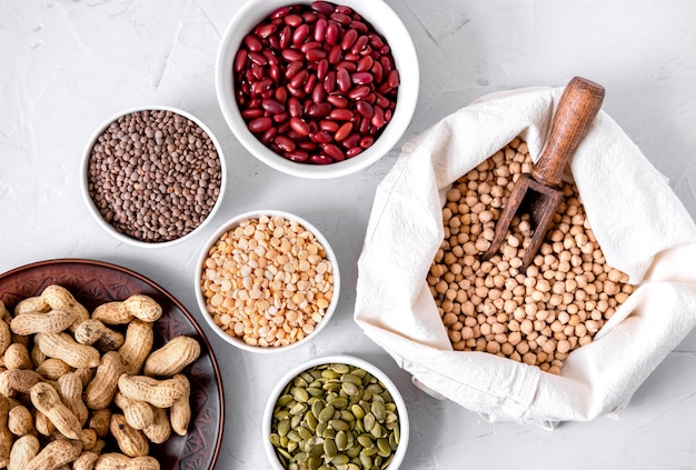 Lentils, Peanuts, Pumpkin Seeds, Chickpeas And Beans In Bowls.