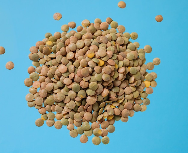 Lentils top view on a turquoise background Healthy eating