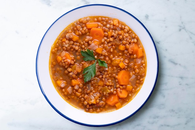 Photo lentils with chorizo and black blood sausage