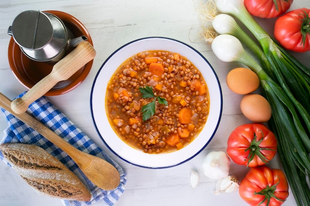 Photo lentils with chorizo and black blood sausage