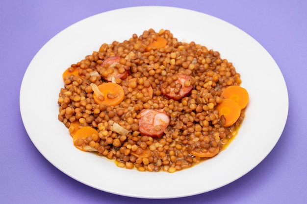 Lentils with chorizo and carrot Typical Spanish recipe