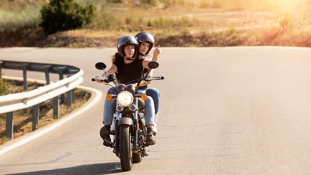 Lesbian couple on a motorcycle road trip