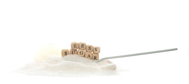 Less Sugar alphabet letter word bead on pile of refined sugar Diabetes concept to reduce sweet food drink Less Sugar letter word on sweetener type White background isolated