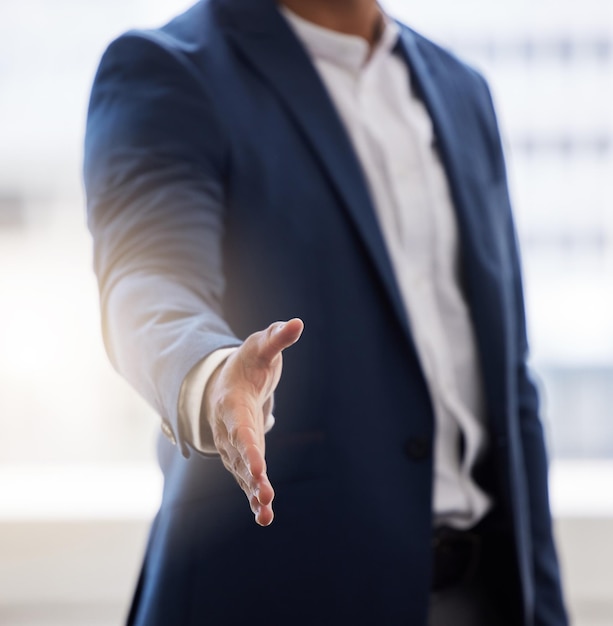 Lets make this happen Cropped shot of a businessman holding his hand out for a handshake