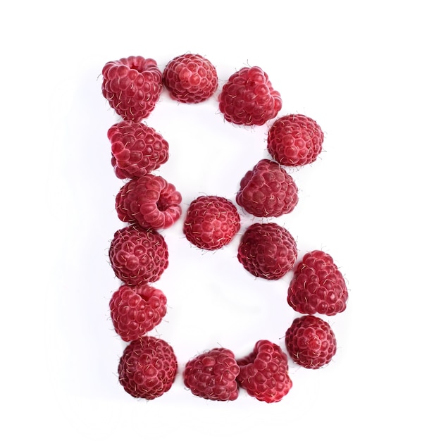 The letter B of the english alphabet of red ripe raspberries