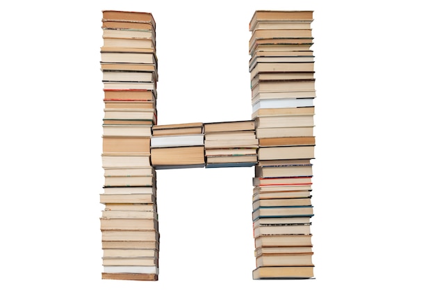 Letter H made of books isolated on white