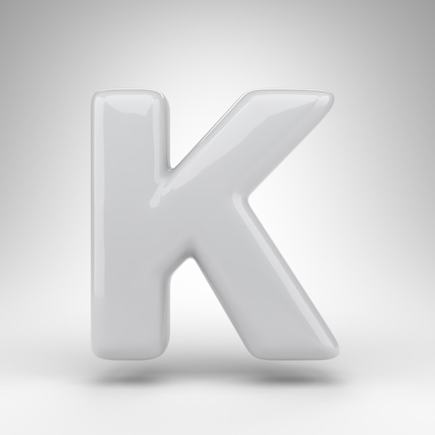 Photo letter k uppercase on white background. white plastic 3d rendered font with glossy surface.