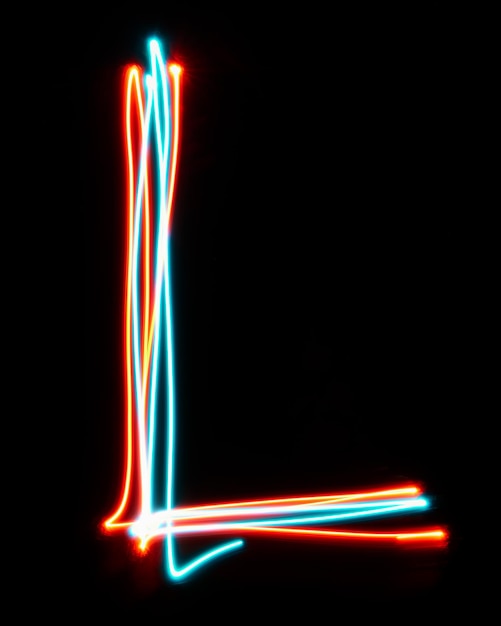 Letter l of the alphabet made from neon sign the blue red light image long exposure with colored