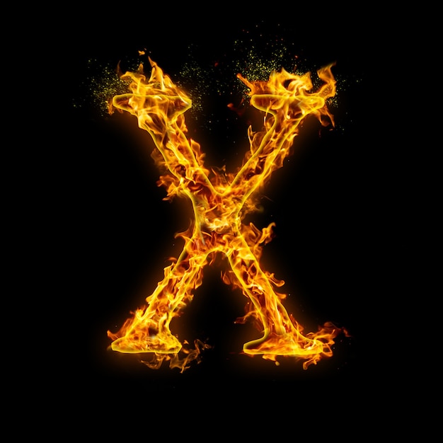 Letter X. Fire flames on black , realistic fire effect with sparks.