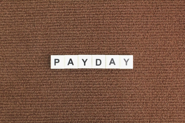 letters of the alphabet with the word payday payday concept the concept of being paid a salary