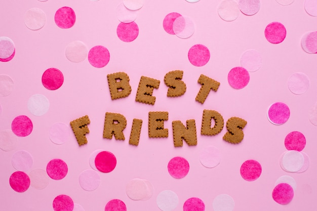 Letters cookies Best friends with confetti on pink